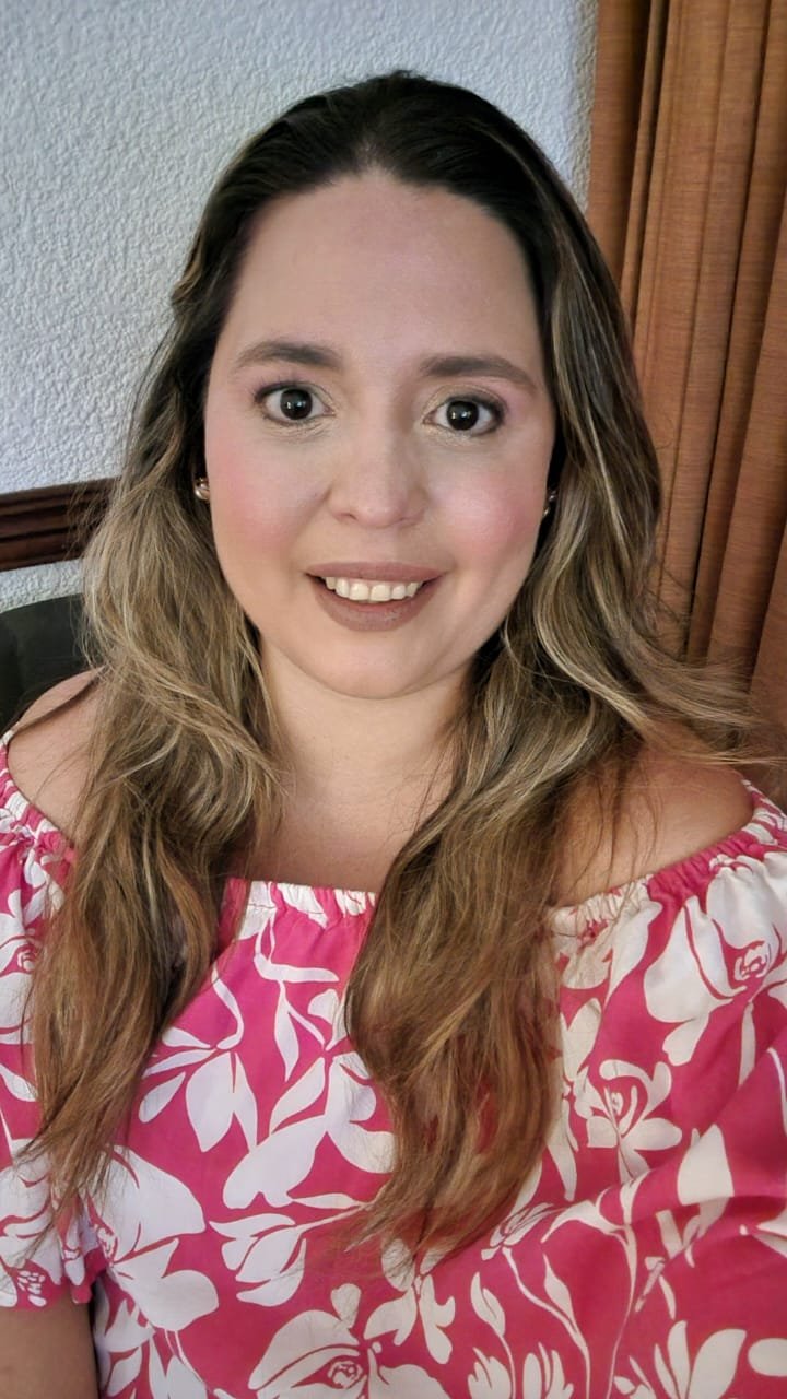 Anna Andrea in a pink dress